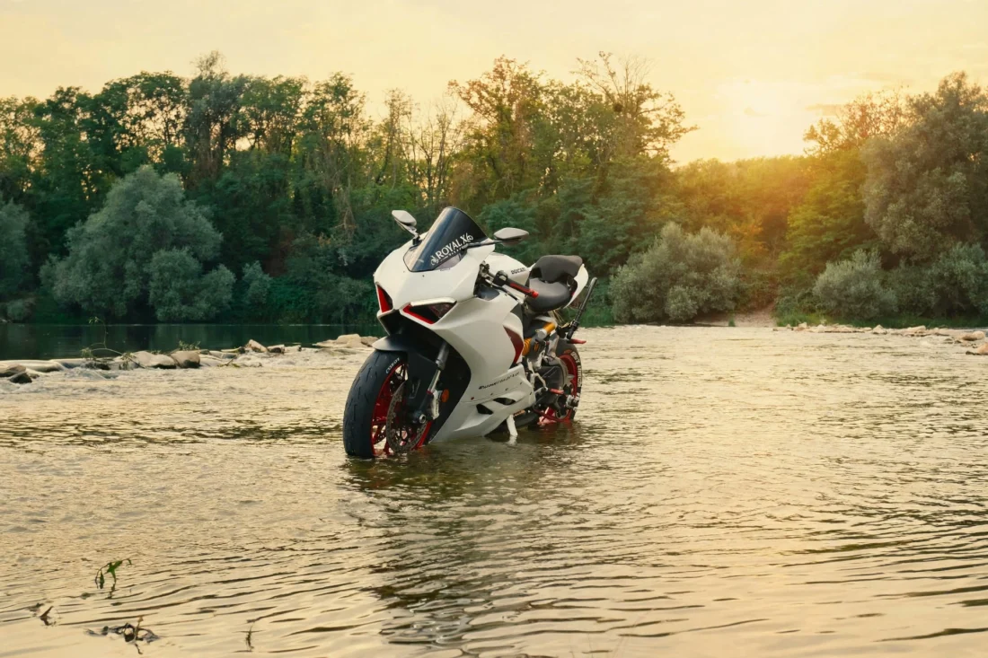 White Ducati Panigale V2 in the river at sunset