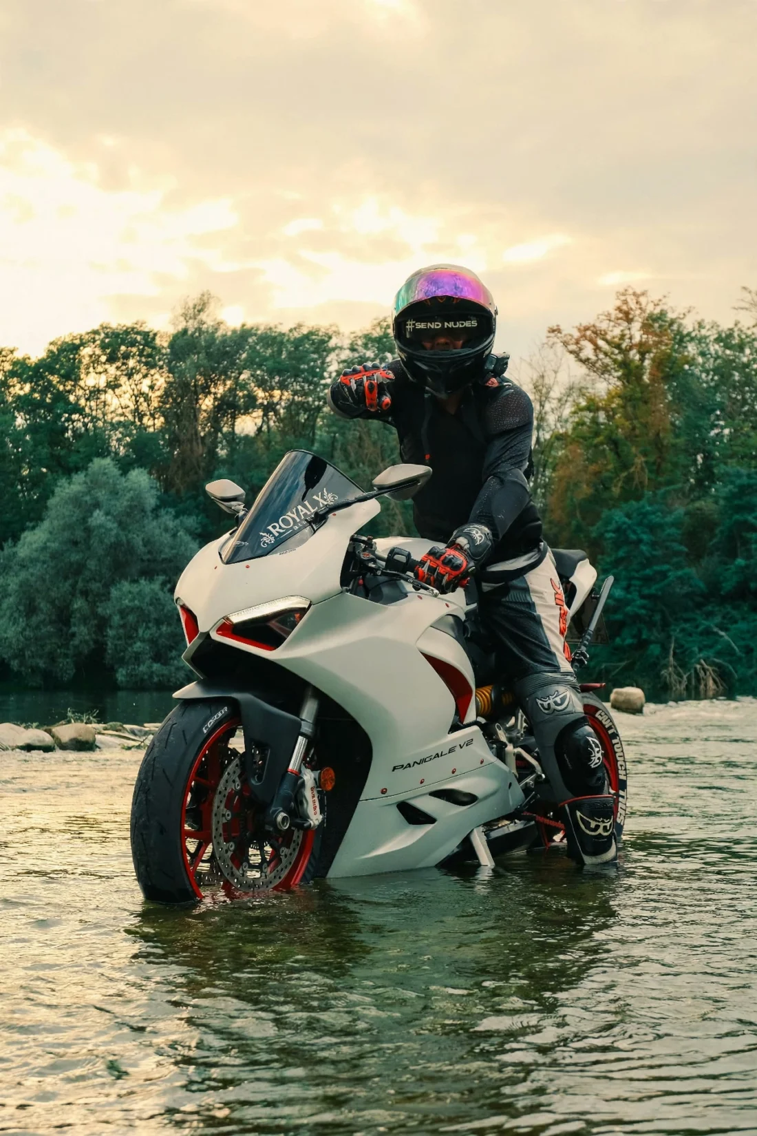 Rider on the Ducati in the river